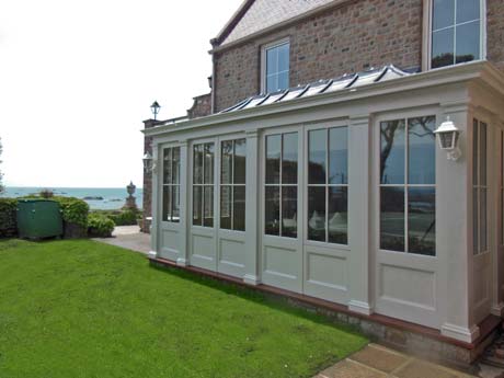 Traditional conservatory with a curved lead roof